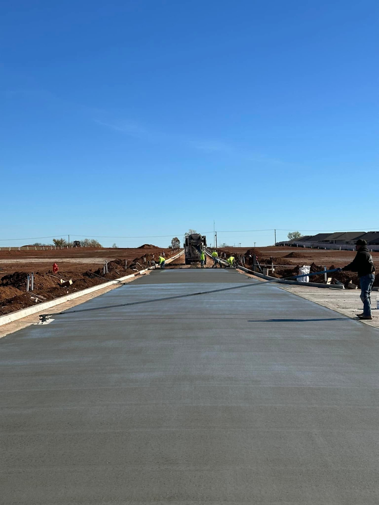 Fuentes Brothers crew placing concrete on a commercial project